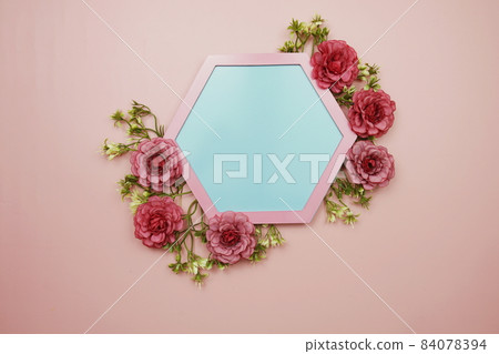 Blue Hexagon background and pink border decorate with flowers on pink background Blue Hexagon background and pink border decorate with flowers on pink background 84078394