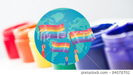Image of rainbow flags over globe with paints in background Image of rainbow flags over globe with paints in background 84078702