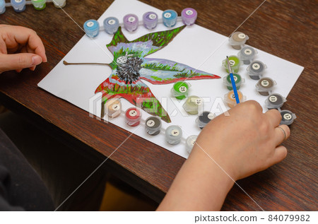 Drawing on dry leaves of wood. Creativity, painting. 84079982