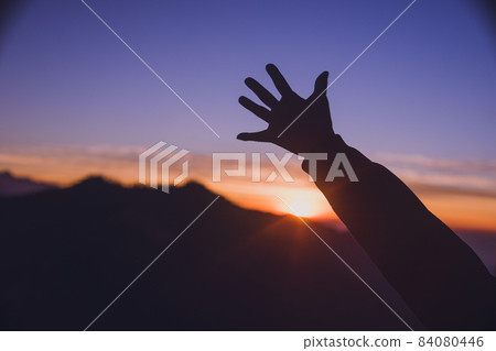 Trekking from Pokhara, a city based in Nepal Superb view point Poon Hill Himalaya sunrise and tourists' hands 84080446