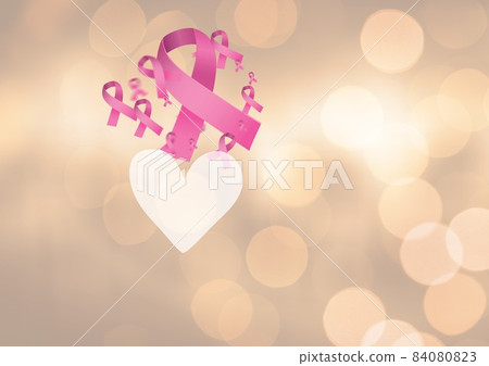 Digitally generated image of multiple pink ribbon and heart icon spots of light on yellow background 84080823