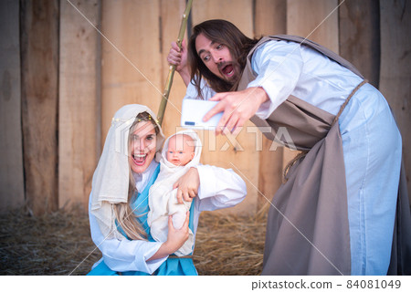 Biblical characters taking selfie while laughing and joking. Nativity scene Biblical characters taking selfie while laughing and joking. Nativity scene 84081049
