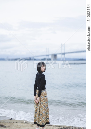 Cool lady at the beach Cool lady at the beach 84082384