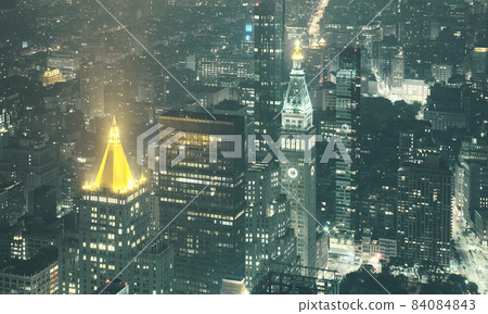 Aerial view of Manhattan at hazy night, color toning applied, New York City, USA. Aerial view of Manhattan at hazy night, color toning applied, New York City, USA. 84084843