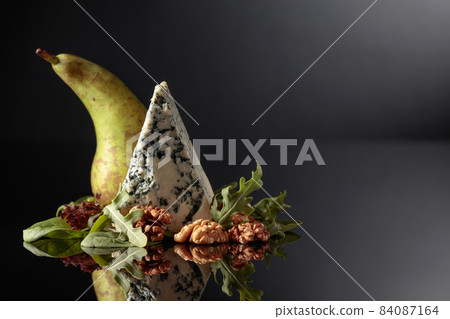 Blue cheese with walnuts, pear and greens. Blue cheese with walnuts, pear and greens. 84087164