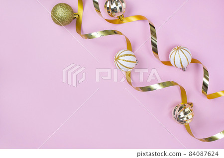 Pink background and ribbon ornaments 84087624