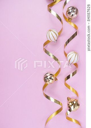 Pink background and ribbon ornaments 84087626