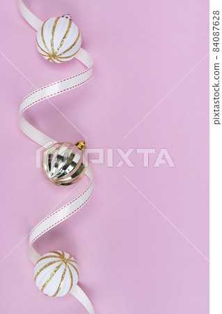 Pink background and ribbon ornaments 84087628