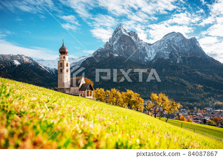St. Valentin Kastelruth Village Church at the autumn Dolomite Alps 84087867