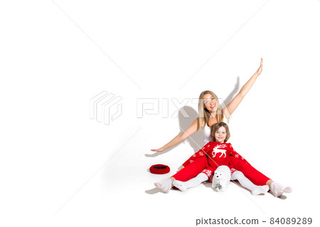 Mom and child having fun together at xmas. Mom and child having fun together at xmas. 84089289