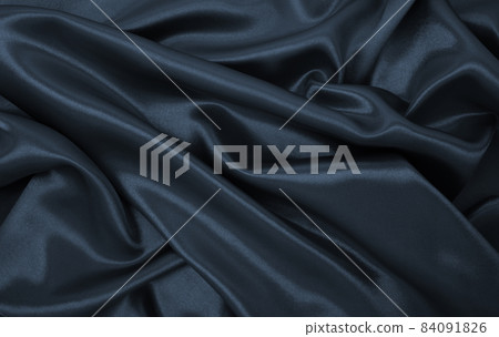 Smooth elegant dark grey silk or satin luxury cloth texture as abstract background. Luxurious background design Smooth elegant dark grey silk or satin luxury cloth texture as abstract background. Luxurious background design 84091826