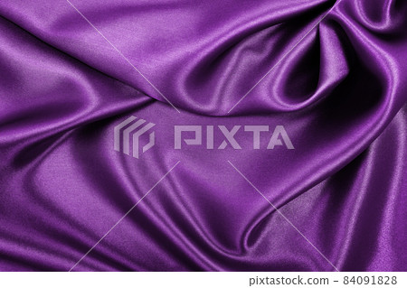 Smooth elegant lilac silk or satin luxury cloth texture as abstract background. Luxurious background design Smooth elegant lilac silk or satin luxury cloth texture as abstract background. Luxurious background design 84091828