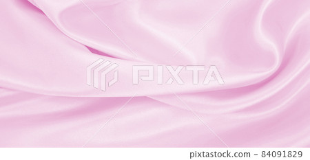 Smooth elegant pink silk or satin texture as wedding background. Luxurious background design Smooth elegant pink silk or satin texture as wedding background. Luxurious background design 84091829