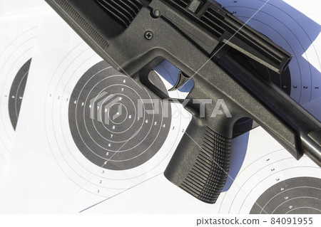 Targets and air rifle barrel. Airgun, pellets and target for shooting 84091955