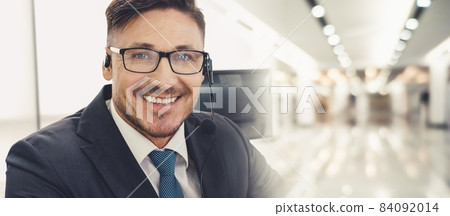 Business people wearing headset working in office broaden view 84092014