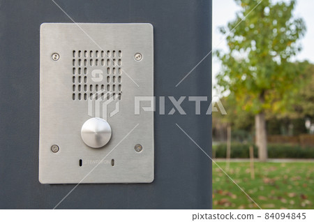 metal security call button in the park on a pole metal security call button in the park on a pole 84094845