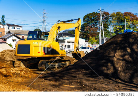 Construction machinery heavy machinery backhoe and blue sky Construction machinery heavy machinery backhoe and blue sky 84096385