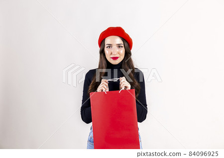 Happy brunette female with long hair in casual outfit posing over isolated white background. Happy brunette female with long hair in casual outfit posing over isolated white background. 84096925