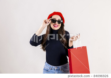 Happy brunette female with long hair in casual outfit posing over isolated white background. Happy brunette female with long hair in casual outfit posing over isolated white background. 84096926