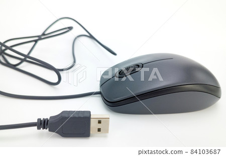 computer mouse on a white background. selective focus. USB connection 84103687