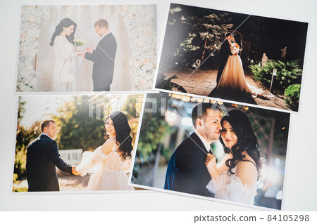 printed on paper photos of the bride and groom. printed on paper photos of the bride and groom. 84105298