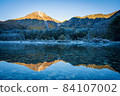 Kamikochi hiking in autumn colors: Mt. Yake reflected in Taisho Pond 84107002