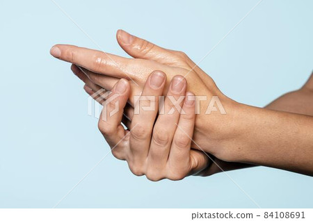 person washing hands indoors. High quality beautiful photo concept person washing hands indoors. High quality beautiful photo concept 84108691