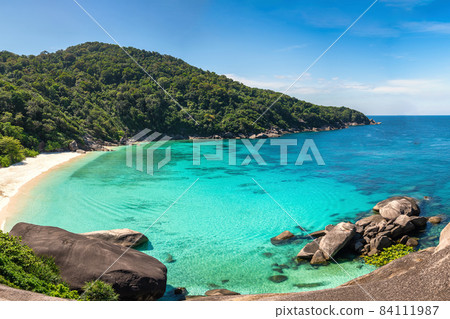 Tropical islands of ocean blue sea water and white sand beach at Similan Islands from famous viewpoint, Phang Nga Thailand nature landscape Tropical islands of ocean blue sea water and white sand beach at Similan Islands from famous viewpoint, Phang Nga Thailand nature landscape 84111987