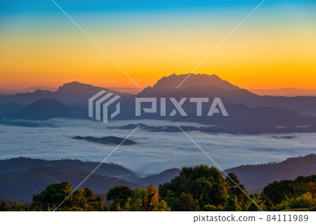 Tropical forest nature landscape view with mountain range sunrise with moving cloud mist at Huai Nam Dang National Park, Chiang Mai Thailand Tropical forest nature landscape view with mountain range sunrise with moving cloud mist at Huai Nam Dang National Park, Chiang Mai Thailand 84111989
