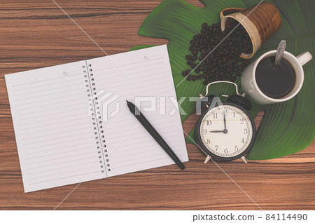 Notebooks and coffee mugs on the desk Notebooks and coffee mugs on the desk 84114490