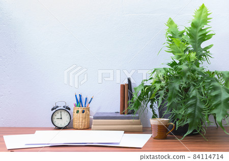 Documents are on the desk at the office Documents are on the desk at the office 84114714