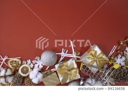 Shopping background for winter, especially Christmas season (gifts, shopping carts, shopping bags) 84116636