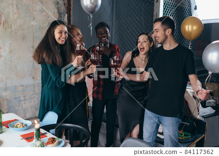 Group of friends celebrating in the bar. 84117362