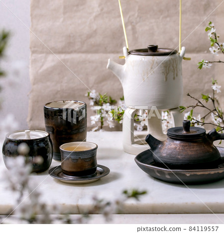 White and black handmade ceramic teapot for tea ceremony White and black handmade ceramic teapot for tea ceremony 84119557