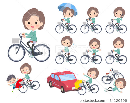 A set of middle-aged women in a blue-green jersey riding a city cycle 84120596