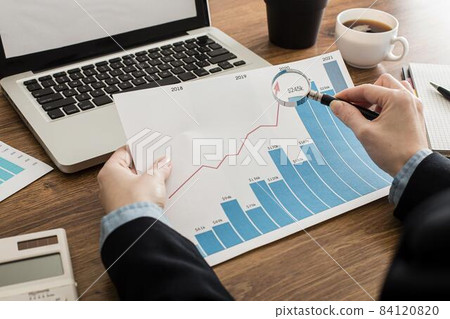 businessman analyzing growth chart office. High quality beautiful photo concept businessman analyzing growth chart office. High quality beautiful photo concept 84120820