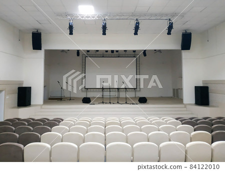 Assembly hall is empty and white with equipment before decoration after repair and construction Assembly hall is empty and white with equipment before decoration after repair and construction 84122010