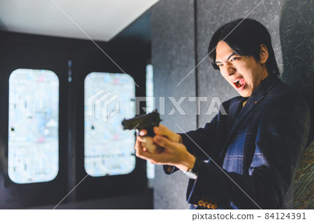 拿著槍的男人 84124391