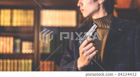 Man with a gun Man with a gun 84124412