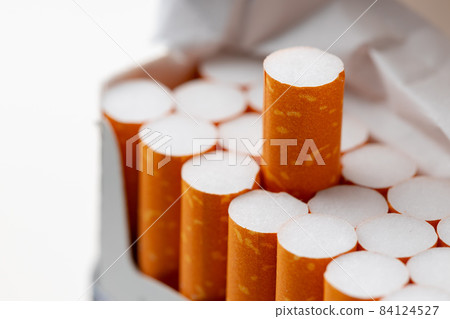 Open new pack of cigarettes close up 84124527