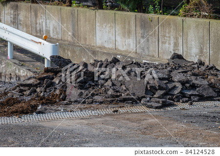 Asphalt pavement removed during road construction 84124528