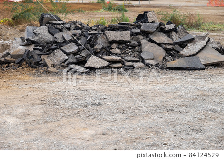 Asphalt pavement removed from a construction site 84124529