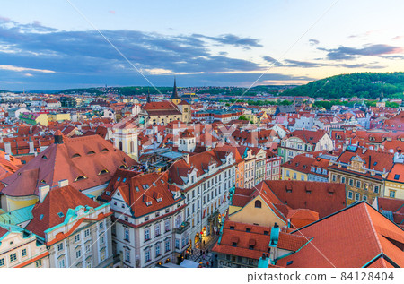 Top aerial panoramic view of Prague Old Town Stare Mesto historical city centre with red tiled roof buildings Top aerial panoramic view of Prague Old Town Stare Mesto historical city centre with red tiled roof buildings 84128404