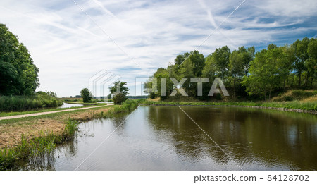 Landscape view over a natural water pond 84128702