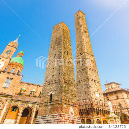 Two medieval towers of Bologna Le Due Torri: Asinelli and Garisenda and Chiesa di San Bartolomeo Gaetano church 84128723