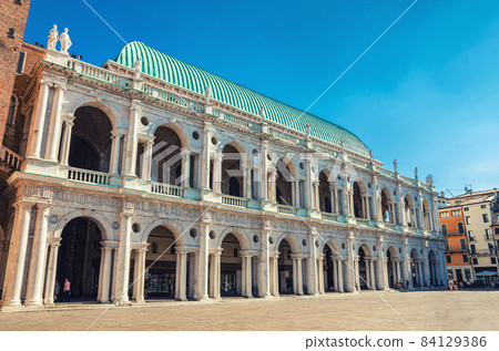 Basilica Palladiana renaissance building with balconies and columns in Piazza dei Signori square 84129386