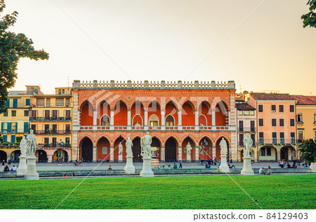 Padua cityscape with Palazzo Loggia Amulea palace neogothic style building and statues 84129403