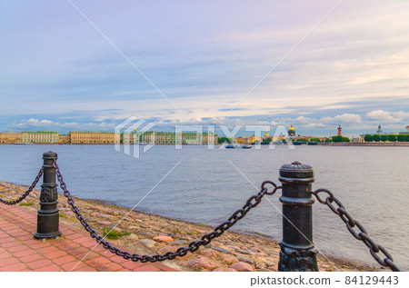 Promenade of Zayachy Hare Island with Fencing chain posts, Neva river 84129443