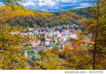 Top aerial panoramic view of Karlovy Vary Carlsbad spa town with colorful beautiful buildings 84129592