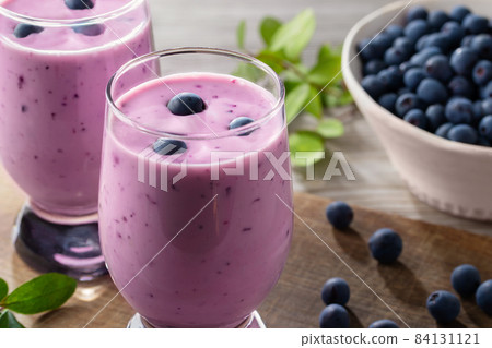 Homemade blueberry yogurt smoothie. Protein shake with berries Homemade blueberry yogurt smoothie. Protein shake with berries 84131121